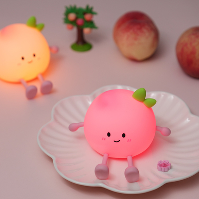 2024 New Creative Peach Shape Night Lamp Soft Silicone 7 Color Changing Eye Care Night Light For Children Gifts Đèn bàn